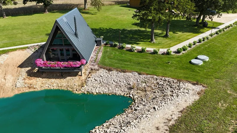 The cabin and pond from above