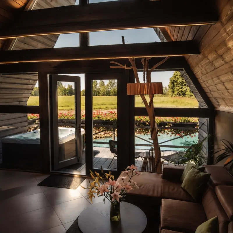 The view from the living area through the glazed gable to the hot tub